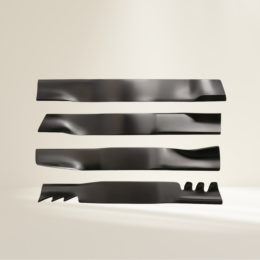 Set of four black metal lawn mower blades on a beige background